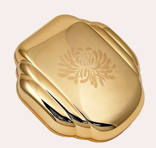 Besame Luminous Translucent Powder & Powder Compact Made of Gold Metallic